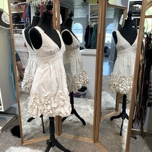 Stunning BCBG ivory dress w/ floral ruffle design